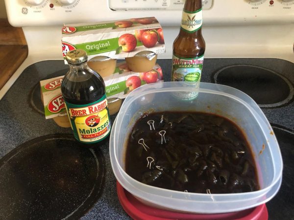 We combine molasses, apple sauce, and a bit of beer to make bait for attracting moths.